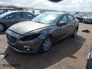 2014 Mazda Mazda3 i Sport with VIN JM1BM1U73E1197354, listed as a IAAI auction lot 41937634 with 140,074 mi miles. Bid and sale history available at carsss.com. Image 2.