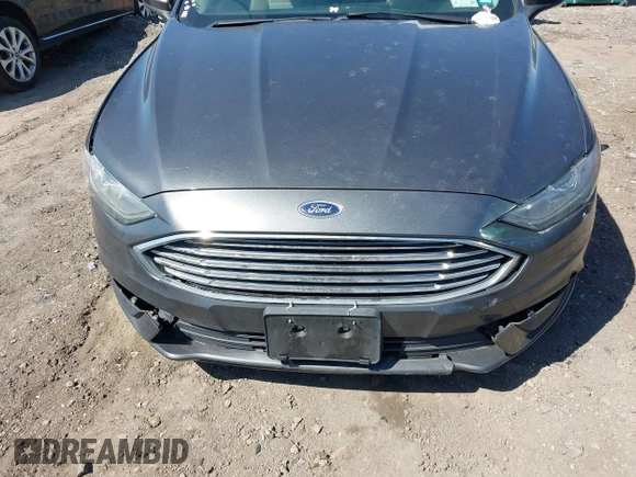2018 Ford Fusion SE z VIN 3FA6P0H74JR233829, wystawiony jako IAAI lot #42049766 z przebiegiem 120 370 mil mil oraz . Historia ofert i sprzedaży dostępna na DreamBid. Obrazek 12.