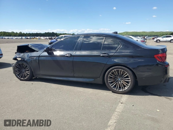 2014 BMW M5 z VIN WBSFV9C53ED594132, wystawiony jako Copart lot #67114384 z przebiegiem 89 020 mil mil oraz Szkoda całkowita • Salvage title. Historia ofert i sprzedaży dostępna na DreamBid. Obrazek 2.