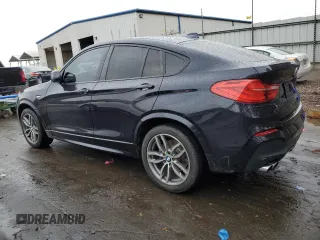 2016 BMW X4 xDrive28i with VIN 5UXXW3C59G0R20451, listed as a Copart auction lot 76909023 with 96,076 mi miles. Bid and sale history available at carsss.com. Image 2.