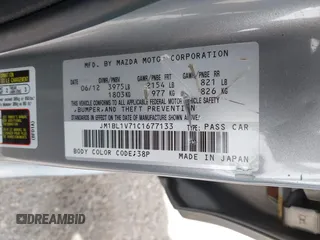 2012 Mazda 3 i Touring with VIN JM1BL1V71C1677133, listed as a IAAI auction lot 41991234 with 104,610 mi miles and . Bid and sale history available at DreamBid. Image 9.