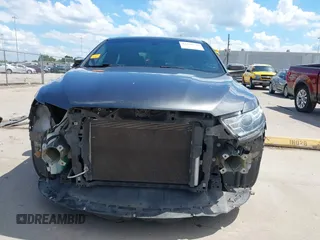 2018 Ford Taurus SEL z VIN 1FAHP2E81JG111809, wystawiony jako IAAI lot #42228720 z przebiegiem 83 532 mil mil oraz . Historia ofert i sprzedaży dostępna na DreamBid. Obrazek 13.