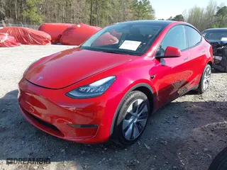 2023 Tesla Model Y Long Range with VIN 7SAYGDEE6PA040783, listed as a IAAI auction lot 41878236 with 32,436 mi miles. Bid and sale history available at carsss.com. Image 23.