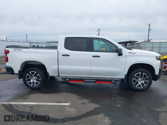 2019 Chevrolet Silverado 1500 LT Trail Boss with VIN 1GCPYFED2KZ261473, listed as a IAAI auction lot 41824661 with 88,206 mi miles and . Bid and sale history available at DreamBid. Image 14.