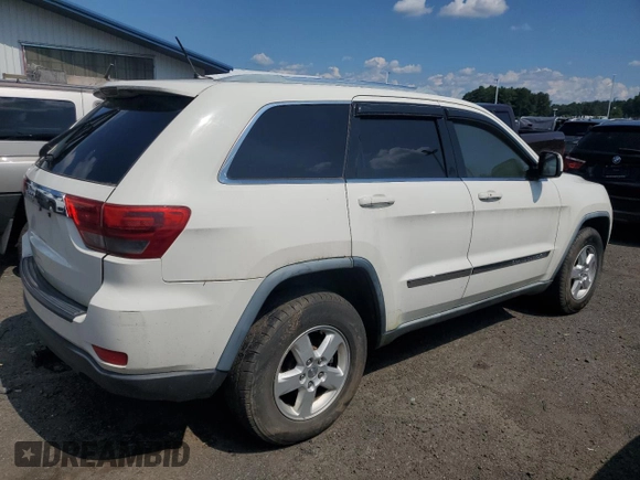 2011 Jeep Grand Cherokee Laredo with VIN 1J4RR4GG8BC572470, listed as a Copart auction lot 64953985 with 171,777 mi miles and Clean title. Bid and sale history available at DreamBid. Image 3.