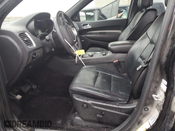 2016 Dodge Durango R/T with VIN 1C4SDJCT0GC387540, listed as a Copart auction lot 78990964 with 131,831 mi miles and Salvage title. Bid and sale history available at DreamBid. Image 7.