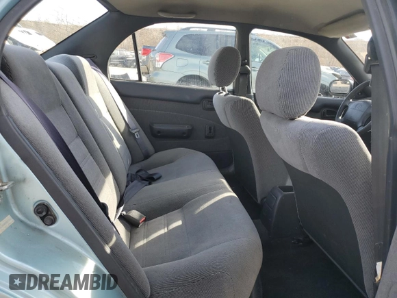 1994 Toyota Corolla Deluxe with VIN JT2AE09B4R0067104, listed as a Copart auction lot 83565064 with 207,923 mi miles and Salvage title. Bid and sale history available at DreamBid. Image 10.