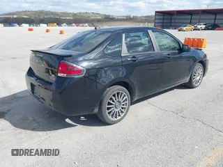 2010 Ford Focus SES with VIN 1FAHP3GN7AW291389, listed as a IAAI auction lot 42003153 with 151,987 mi miles. Bid and sale history available at carsss.com. Image 4.
