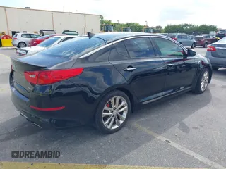 2014 Kia Optima SXL Turbo with VIN 5XXGR4A69EG348934, listed as a IAAI auction lot 42322630 with 119,171 mi miles and . Bid and sale history available at DreamBid. Image 4.