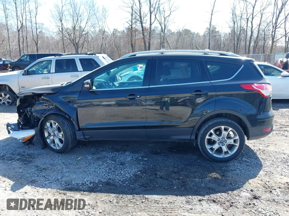 2014 Ford Escape Titanium with VIN 1FMCU9JX2EUA96338, listed as a IAAI auction lot 41806850 with 127,745 mi miles. Bid and sale history available at carsss.com. Image 14.