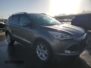 2014 Ford Escape Titanium with VIN 1FMCU9J93EUA77136, listed as a Copart auction lot 52454785 with 154,607 mi miles and Salvage Title. Bid and sale history available at carsss.com. Image 4.