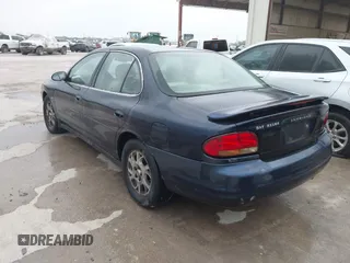 2000 Oldsmobile Intrigue GLS z VIN 1G3WX52H5YF182762, wystawiony jako IAAI lot #42273039 z przebiegiem 223 471 mil mil oraz . Historia ofert i sprzedaży dostępna na DreamBid. Obrazek 3.