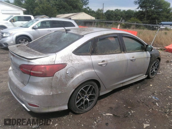 2015 Ford Focus SE with VIN 1FADP3F2XFL345234, listed as a IAAI auction lot 42402207 with Not provided miles and . Bid and sale history available at DreamBid. Image 4.