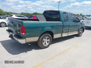 2000 Ford F-150 XL with VIN 1FTZX1729YNB93649, listed as a IAAI auction lot 42069599 with 1 mi miles. Bid and sale history available at carsss.com. Image 4.