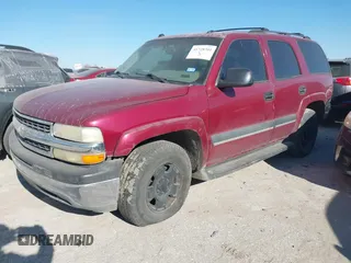 2004 Chevrolet Tahoe LT z VIN 1GNEC13ZX4R166600, wystawiony jako IAAI lot #41728301 z przebiegiem 245 044 mil mil oraz . Historia ofert i sprzedaży dostępna na DreamBid. Obrazek 2.
