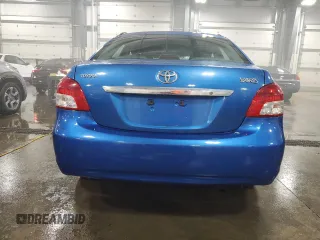 2009 Toyota Yaris with VIN JTDBT903991315725, listed as a Copart auction lot 52566735 with 177,044 mi miles and Salvage Title. Bid and sale history available at DreamBid. Image 6.