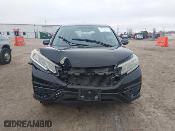 2015 Honda CR-V LX with VIN 2HKRM3H35FH501019, listed as a IAAI auction lot 41014683 with 111,168 mi miles and . Bid and sale history available at carsss.com. Image 12.