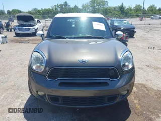 2012 MINI Countryman S z VIN WMWZC3C55CWL83472, wystawiony jako IAAI lot #42289981 z przebiegiem 101 812 mil mil oraz . Historia ofert i sprzedaży dostępna na DreamBid. Obrazek 12.