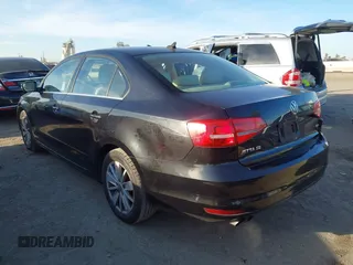 2015 Volkswagen Jetta Sedan 1.8T SE with VIN 3VWD17AJ3FM407697, listed as a IAAI auction lot 40659086 with 107,834 mi miles. Bid and sale history available at carsss.com. Image 3.