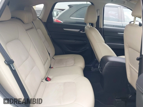 2017 Mazda CX-5 Touring z VIN JM3KFBCL5H0128584, wystawiony jako IAAI lot #42354669 z przebiegiem 56 563 mil mil oraz . Historia ofert i sprzedaży dostępna na DreamBid. Obrazek 8.