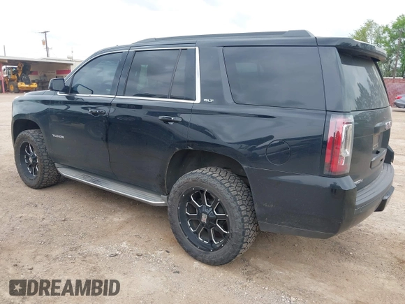 2015 GMC Yukon SLT with VIN 1GKS1BKC5FR274408, listed as a IAAI auction lot 41942157 with 165,978 mi miles. Bid and sale history available at carsss.com. Image 3.