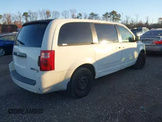 2010 Dodge Grand Caravan SE with VIN 2D4RN4DE8AR498559, listed as a IAAI auction lot 40886502 with Not Provided miles and . Bid and sale history available at DreamBid. Image 4.