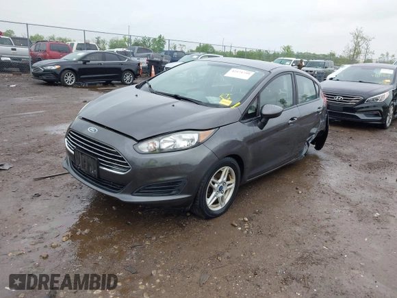 2018 Ford Fiesta SE with VIN 3FADP4EJ7JM130027, listed as a IAAI auction lot 42171799 with 65,253 mi miles and . Bid and sale history available at DreamBid. Image 2.