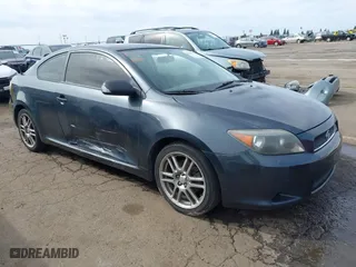 2006 Scion tC with VIN JTKDE167160118539, listed as a IAAI auction lot 41847400 with 169,122 mi miles. Bid and sale history available at carsss.com. Image 1.