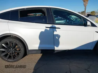 2022 Tesla Model X with VIN 7SAXCBE59NF364984, listed as a IAAI auction lot 41809256 with Not Provided miles and . Bid and sale history available at DreamBid. Image 14.