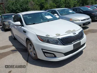 2015 Kia Optima LX z VIN 5XXGM4A73FG410160, wystawiony jako IAAI lot #42576110 z przebiegiem 167 060 mil mil oraz . Historia ofert i sprzedaży dostępna na DreamBid. Obrazek 1.