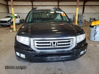 2013 Honda Ridgeline RTL with VIN 5FPYK1F50DB015599, listed as a Copart auction lot 50852074 with 159,411 mi miles and Salvage Title. Bid and sale history available at carsss.com. Image 5.