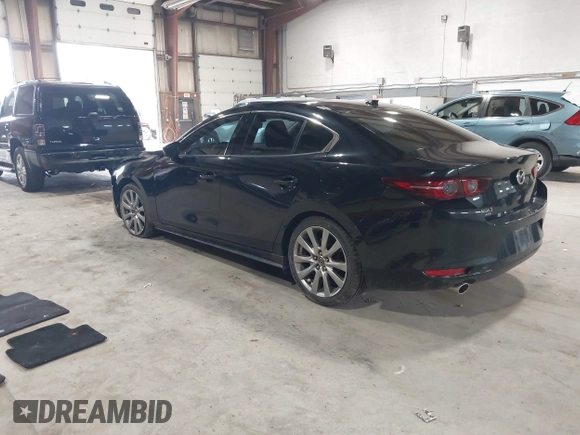 2020 Mazda 3 Premium with VIN 3MZBPBEM4LM123018, listed as a IAAI auction lot 41967652 with 84,642 mi miles and . Bid and sale history available at DreamBid. Image 3.
