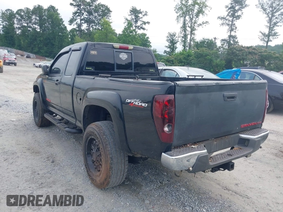 2004 GMC Canyon SLE Z71 z VIN 1GTDT196548169346, wystawiony jako IAAI lot #42482724 z przebiegiem 244 045 mil mil oraz . Historia ofert i sprzedaży dostępna na DreamBid. Obrazek 3.