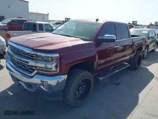 2014 Chevrolet Silverado 1500 LT with VIN 3GCPCRECXEG410417, listed as a IAAI auction lot 41854194 with 128,352 mi miles. Bid and sale history available at carsss.com. Image 2.