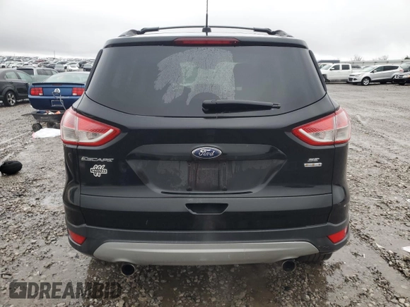 2013 Ford Escape SE z VIN 1FMCU9GX3DUA77576, wystawiony jako Copart lot #84225614 z przebiegiem 110 470 mil mil oraz Szkoda całkowita • Salvage title. Historia ofert i sprzedaży dostępna na DreamBid. Obrazek 6.