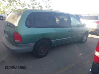1999 Plymouth Voyager Grand SE z VIN 2P4GP44G1XR180660, wystawiony jako IAAI lot #42149571 z przebiegiem Nie podano mil oraz . Historia ofert i sprzedaży dostępna na DreamBid. Obrazek 4.
