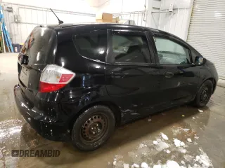 2009 Honda Fit with VIN JHMGE88259S053426, listed as a Copart auction lot 87894815 with 143,665 mi miles and Salvage Title. Bid and sale history available at carsss.com. Image 3.