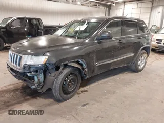 2011 Jeep Grand Cherokee 70th Anniversary with VIN 1J4RR4GG3BC745652, listed as a IAAI auction lot 41133698 with 217,948 mi miles. Bid and sale history available at carsss.com. Image 17.