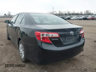 2012 Toyota Camry L with VIN 4T1BF1FK0CU520424, listed as a IAAI auction lot 41903916 with 158,001 mi miles. Bid and sale history available at carsss.com. Image 3.