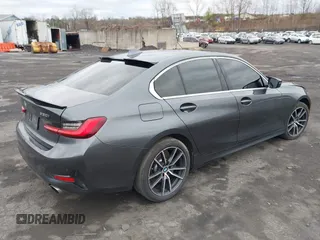 2021 BMW 3 Series 330i xDrive z VIN 3MW5R7J03M8B73085, wystawiony jako IAAI lot #42022710 z przebiegiem 49 489 mil mil oraz . Historia ofert i sprzedaży dostępna na DreamBid. Obrazek 4.