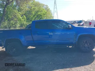 2018 Chevrolet Colorado 4WD Z71 z VIN 1GCGTDEN6J1195082, wystawiony jako IAAI lot #42158668 z przebiegiem 75 631 mil mil oraz . Historia ofert i sprzedaży dostępna na DreamBid. Obrazek 13.