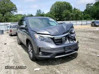 2019 Honda Pilot EX-L with VIN 5FNYF6H52KB043098, listed as a Copart auction lot 59011445 with 88,398 mi miles and Salvage title. Bid and sale history available at DreamBid. Image 14.