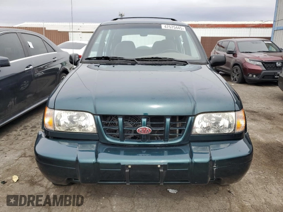 1999 Kia Sportage with VIN KNDJB7232X5612065, listed as a Copart auction lot 47575445 with 77,486 mi miles and Clean Title. Bid and sale history available at carsss.com. Image 5.