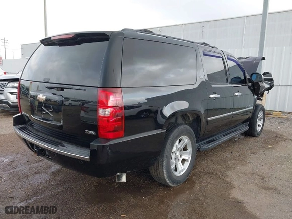 2009 Chevrolet Suburban LTZ with VIN 1GNFK36389J124653, listed as a IAAI auction lot 41935393 with 117,144 mi miles. Bid and sale history available at carsss.com. Image 4.