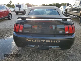 2004 Ford Mustang Deluxe with VIN 1FAFP44414F125267, listed as a Copart auction lot 74595714 with 0 mi miles and Salvage Title. Bid and sale history available at carsss.com. Image 6.