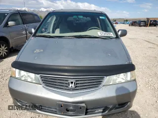 2001 Honda Odyssey EX z VIN 2HKRL18691H571178, wystawiony jako Copart lot #57343205 z przebiegiem 198 506 mil mil oraz Czysty tytuł • Clean title. Historia ofert i sprzedaży dostępna na DreamBid. Obrazek 5.