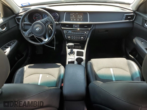 2018 Kia Optima LX z VIN 5XXGT4L35JG191868, wystawiony jako Copart lot #56230865 z przebiegiem 128 208 mil mil oraz Czysty tytuł • Clean title. Historia ofert i sprzedaży dostępna na DreamBid. Obrazek 8.