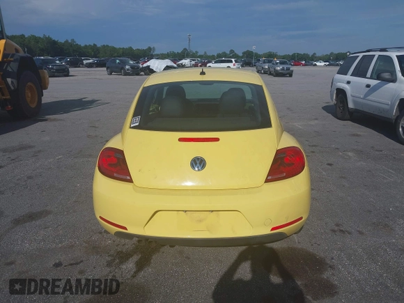 2013 Volkswagen Beetle 2.5L with VIN 3VWHX7AT7DM613197, listed as a IAAI auction lot 41298890 with 130,219 mi miles and . Bid and sale history available at DreamBid. Image 16.