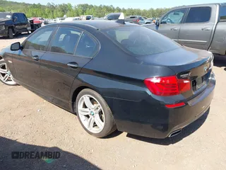 2013 BMW 5 Series 550i with VIN WBAFR9C50DDX81156, listed as a IAAI auction lot 42015608 with 99,962 mi miles and . Bid and sale history available at carsss.com. Image 3.