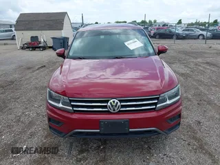 2018 Volkswagen Tiguan S with VIN 3VV1B7AX3JM045193, listed as a IAAI auction lot 42311886 with 69,049 mi miles and . Bid and sale history available at DreamBid. Image 12.